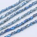 Macro shot of blue faceted fish-shaped crystal beads for DIY jewelry making - 6*10mm (approximately 50 Beads) / Dark Blue AB