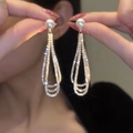 Long tassel drop earrings with white pearls and sparkling rhinestone layers - Pearl Rhinestone Tassel / Silver