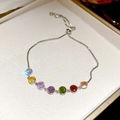 Detailed close-up of a rainbow gemstone bracelet with adjustable silver sliding clasp - 25# Silver Colorful Round Slider Style