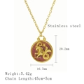 Golden Capricorn zodiac pendant necklace in stainless steel with sparkly red inlay - Capricorn