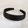 Elegant wide black satin headband for women featuring a minimalist solid color design - Black