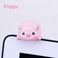 Close-up of cute pink pig mini ornament for computer monitor and car dashboard decor - Little Pig Monitor Hanger