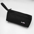 Close-up of durable black canvas pencil case showing the zipper and wrist strap detail - Black
