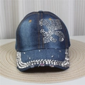 Close-up of denim baseball cap with rhinestone flower pattern and metal stud details - No.30-Studded Distressed-Dark Blue