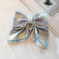 Blue and cream plaid bow hair clip featuring a soft fabric texture for women - Hoshino Plaid