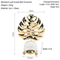 Nordic monstera leaf sculpture with glass crystal ball in elegant gold iron finish - Monstera Deliciosa - Crystal Ball