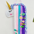 Unicorn wall hanging hair clip organizer with colorful felt design and soft yarn tassels - Purple Unicorn