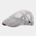 Detail view of the breathable grey mesh fabric and adjustable metal buckle on beret cap - Adjustable / Light Gray