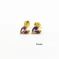Detail of elegant gold earrings featuring pear-cut purple gemstones and small zircon accents - Purple Artistic Zirconia (ZYN-DKE244G-D) / Purple