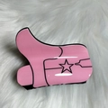 Pink boot-shaped hair claw clip made of acrylic on white faux fur background - Pink Boot Style