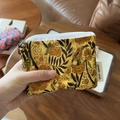 Close-up of yellow cotton coin purse with vintage floral print and Simple Wish side label - Turmeric Floral