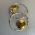 Detail of asymmetric gold sun and moon hoop earrings with handcrafted hammered texture - Asymmetric Sun & Moon / Gold