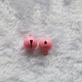 Pink candy-colored 14mm metal craft bells on a white plush background for DIY - Deep Pink