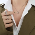 Minimalist silver-tone titanium oval pendant necklace with elegant beaded chain style - Steel