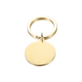 Close-up of golden polished stainless steel round tag keychain with mirror finish - Gold