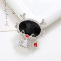 Detailed view of cartoon girl brooch with large black gemstone and sparkling crystals - Silver Base Black (D2268)