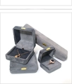 Detailed view of gray velvet jewelry boxes for rings and necklaces on white background - Bracelet Box / Space Gray