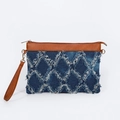 Tie-dye denim bucket bag with frayed edges and brown leather handle contrast - Clutch Bag / Dark Blue