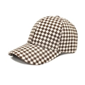 Detailopname van het pied-de-poule patroon en tweed textuur op de modieuze baseballpet - M(56-58cm) / Beige