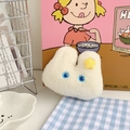 Détail d'un porte-clés lapin en peluche blanche avec yeux bleus et accessoire étoile - Lapin Blanc avec Étoile Jaune