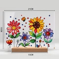 Detail of acrylic flower plaque with sunflower and butterfly on a bamboo base - Style BTU433 With Large Wood Base