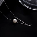 S925 silver necklace featuring a white pearl and a sparkling pavé letter L pendant - Letter L