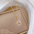 Gold titanium flower necklace with crystal ring pendant, weight 3.4g and 40+5cm chain - Titanium Steel Chain / Copper Pendant / Gold Flower Circle Style