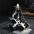 Backflow incense burner in black ceramic with leaf layers and cascading smoke effect - Perfect Match