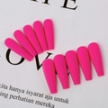 Detail view of long coffin matte rose pink press-on nails arranged on white background card - Rose Red