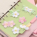 Self-adhesive floral embroidery patches featuring pink cherry blossoms and white flowers - Set of 6 Flower Assortment