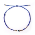 Blue beaded Bohemian evil eye bracelet with adjustable woven cord and golden accents - Blue