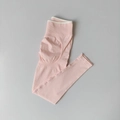 Seamless high-waisted yoga leggings in light pink with ribbed waistband and peach lift detail - Light Pink