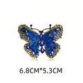Vintage gold butterfly brooch with blue crystals and enamel detail measuring 6.8cm by 5.3cm - Butterfly Blue (KC0154-2)