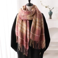 Pink and beige houndstooth scarf with tassels on model in minimalist interior - Rose Pink