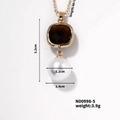 Collier en acier doré avec une pierre carrée marron et un pendentif perle blanche élégant - Zircone Ambre + Perle