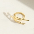 Macro shot of 14K gold plated double-layer wrap ring on textured beige surface - Three-layer Style