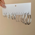 Dettaglio di un set di 6 paia di orecchini d'argento con perle e cerchi geometrici - Set da 12 pezzi / Argento