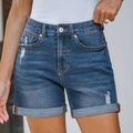 Detail of high waisted dark blue denim shorts featuring distressed rips and cuffed hems - S / Dark Blue