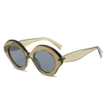Gafas de sol ovaladas oversize con montura verde oliva transparente y lentes oscuras - Montura Verde Lentes Grises