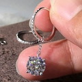 Elegant silver four-prong round zircon drop earrings with shimmering micro-pave hoop - Silver