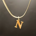 Elegant gold-plated snake chain necklace featuring a polished capital N letter pendant - Letter N (5592272000734)