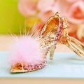 Close-up of pink crystal high heel keychain with fluffy pompom and gold lobster clasp - Pink Plush High Heels