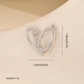 Detail of silver heart pendant with zircons showing dimensions of 1.8cm by 1.6cm - White Gold Hollow Heart (MYYX00675)