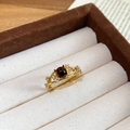 Detailed close-up of a gold ring with black pearl and zircons in a jewelry box - Gold Hollow Brown Gemstone Style (4# Ring-Gold-Brown)