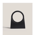 Minimalist black geometric leather handbag with a unique circular cutout handle - Black