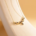 Elegant gold necklace with V-shaped blue gemstone branch pendant and white zircons - XL1998 Deer Horn V-Shape Blue Zircon Gold