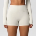 Detail of high-waist seamless cream yoga shorts featuring brushed fabric and elastic fit - 7101 Shorts - Light Ivory / S
