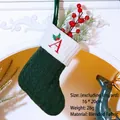 Dark green knitted Christmas stocking with white plush cuff and red embroidered letter A - Embroidered Knit Christmas Stocking-A