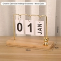 Minimalist wooden flip calendar with gold metal stand and decorative bear ornament - Metal Bear-Wood Base