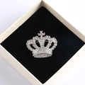 Silver crown brooch with sparkling crystals on a black velvet cushion in a gift box - Xd825308-2